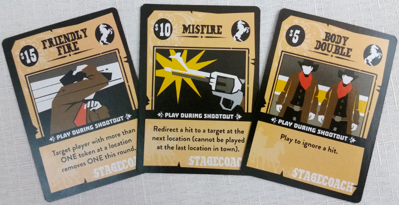 Boomtown Bandit cards, both with an single-use ability and a dollar value.