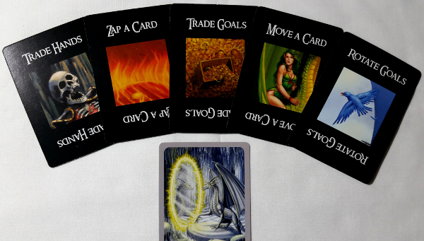 The five possible Action cards in the game, and the poor Silver dragon stuck at their whim